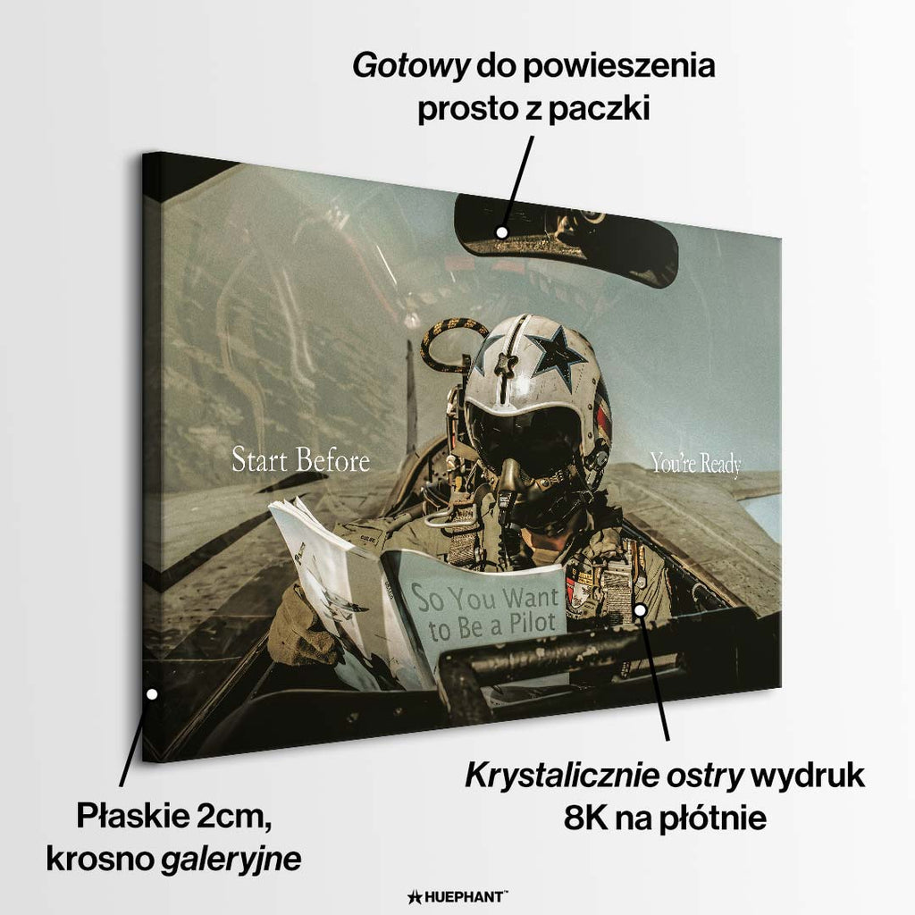 Motywacyjny obraz na płótnie Start Before You're Ready marki Huephant. Wydruk galeryjny przedstawiający pilota myśliwca czytającego instrukcję.
