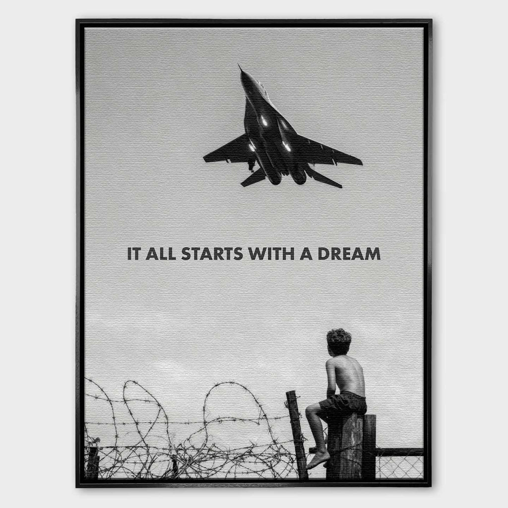 Motywacyjny obraz na płótnie It All Starts With a Dream przedstawiający chłopca patrzącego na samolot, symbolizujący początek marzeń i dążenie do sukcesu.
