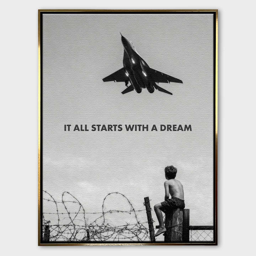 Motywacyjny obraz na płótnie It All Starts With a Dream przedstawiający chłopca patrzącego na samolot, symbolizujący początek marzeń i dążenie do sukcesu.