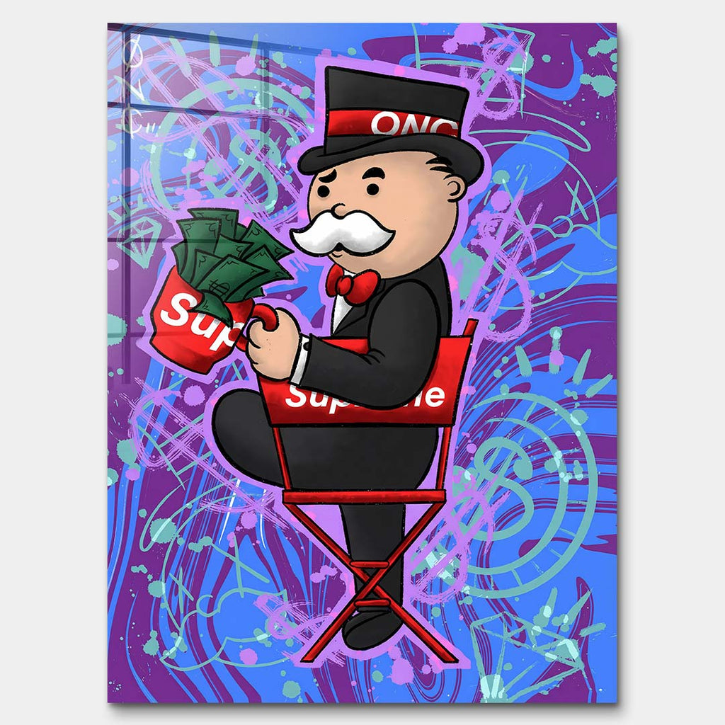 Nowoczesny obraz pop-art na szkle akrylowym przedstawiający postać w cylindrze z kubkiem pełnym banknotów na czerwonym krześle. Wydruk galeryjny Huephant.