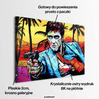 Nowoczesny obraz na płótnie w stylu pop-art przedstawiający portret mężczyzny z pistoletem na tle palm. Kolorowy wydruk galeryjny od Huephant, edycja limitowana