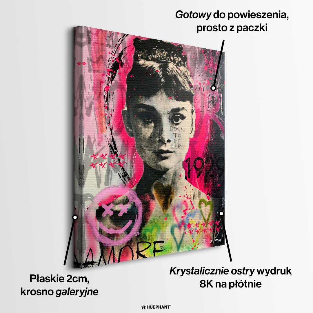 Czarno-biały obraz na płótnie Audrey Hepburn w stylu sztuki nowoczesnej. Wydruk galeryjny pop art z czerwonymi sercami i dużym napisem AMORE w tle.