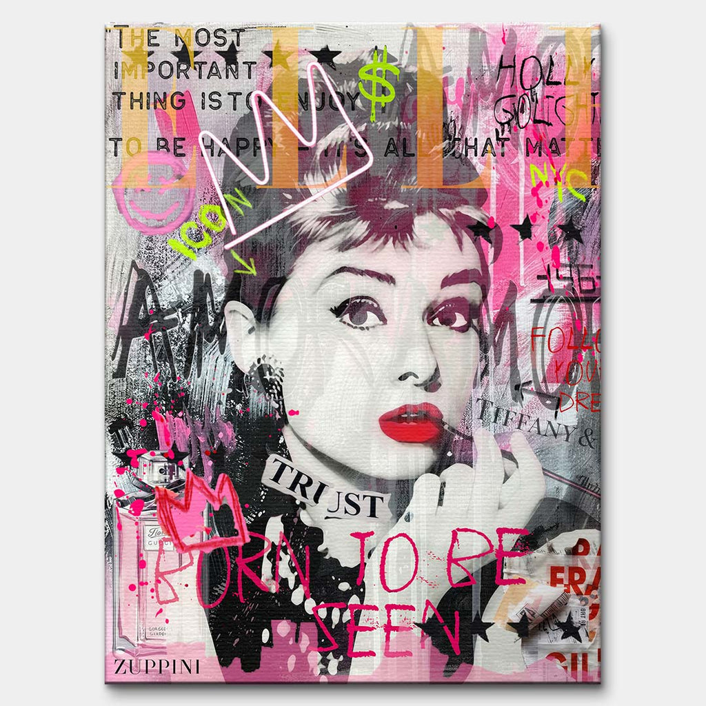 Nowoczesny obraz na płótnie Audrey Hepburn Icon. Wydruk galeryjny w różowo-szarej kolorystyce z elementami graffiti, neonową koroną i napisem Born to be seen.