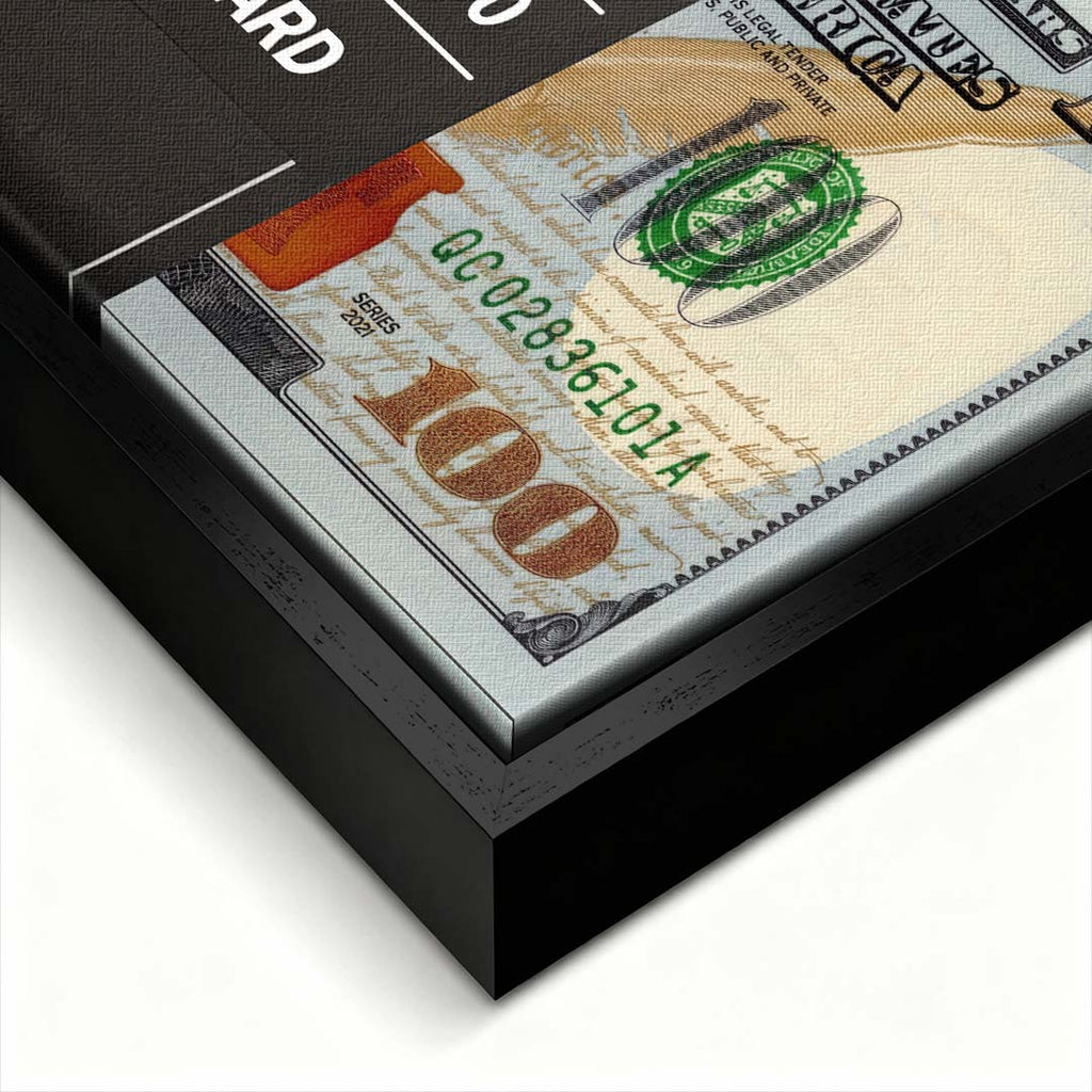Motywacyjny obraz na płótnie przedstawiający banknot 100 dolarów spięty opaską z napisem Hustle Hard. Wydruk galeryjny Huephant.