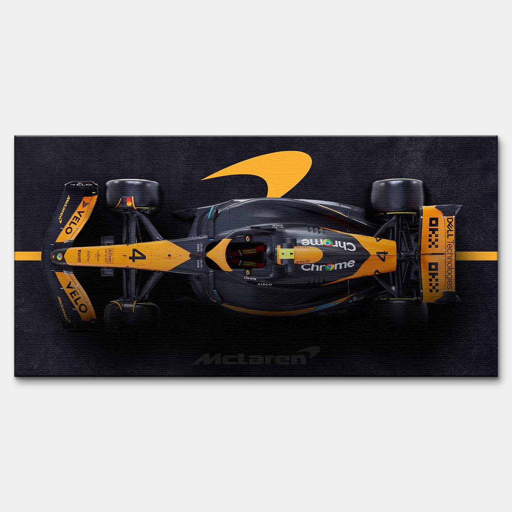 obraz na płótnie f1 mclaren bolid z lotu ptaka pomarańczowo czarny motorsport
