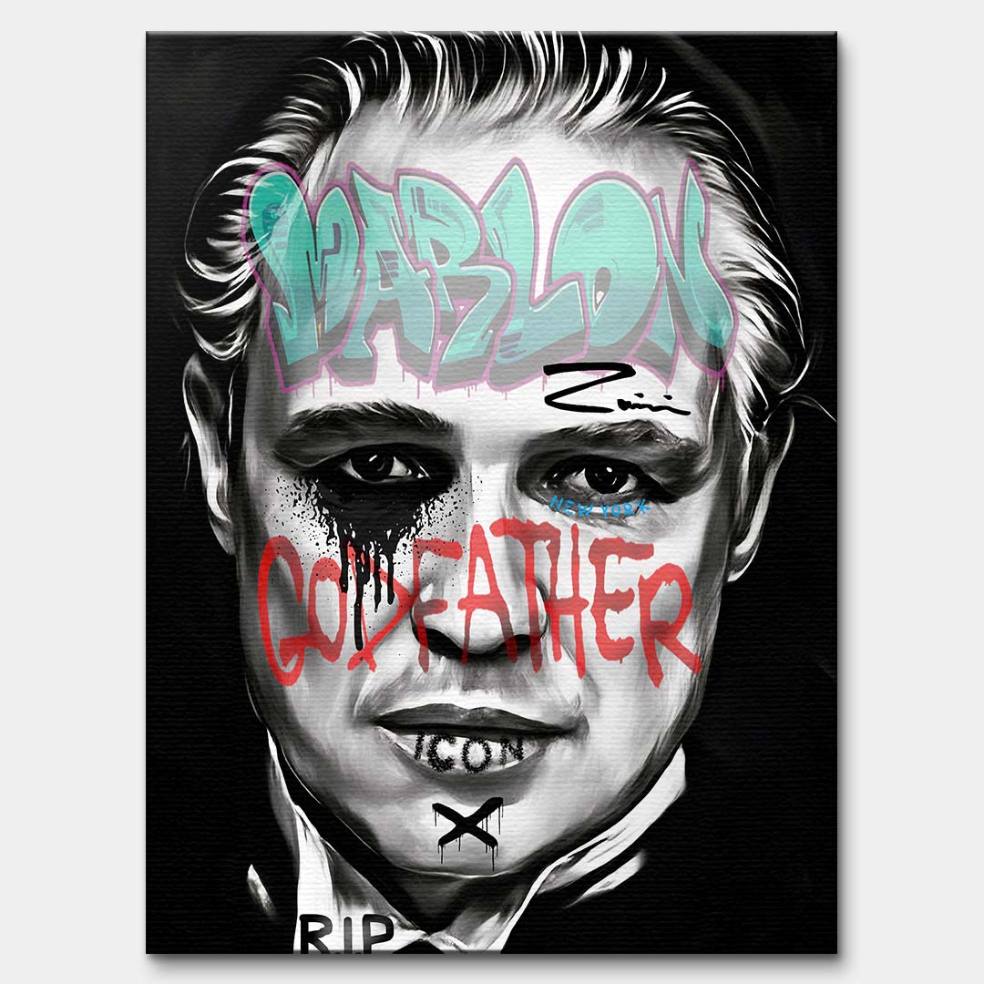 Czarno-biały obraz na płótnie Marlon Brando z filmu Ojciec Chrzestny. Wydruk galeryjny pop art z niebieskim napisem Marlon i czerwonym tekstem Godfather.
