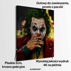 Obraz na płótnie Joker – postać w makijażu klauna paląca papierosa, symbol chaosu, odwagi i buntu.