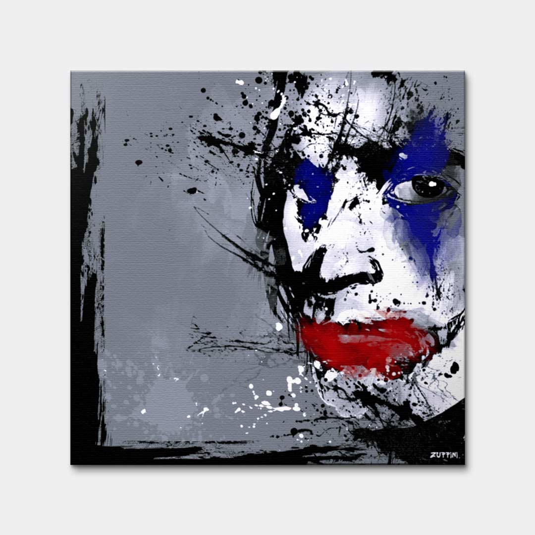 Obraz na płótnie z twarzą Jokera w stylu splash art. Nowoczesny wydruk galeryjny w kolorach szarym, niebieskim i czerwonym. Kunst pop-art.