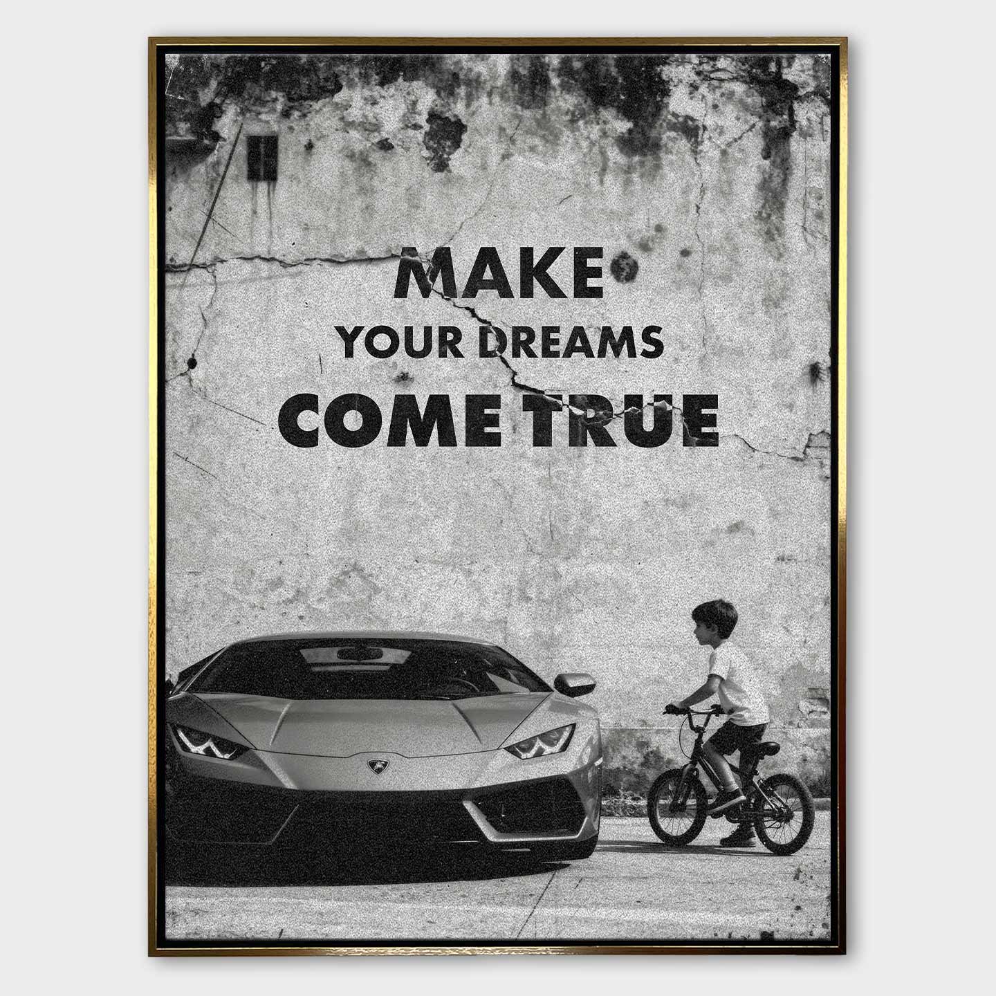 Obraz motywacyjny na płótnie „Make Your Dreams Come True” – czarno-biała scena z Lamborghini i chłopcem na rowerze, z napisem motywacyjnym.