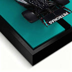 obraz na płótnie f1 mercedes amg petronas bolid z lotu ptaka turkus czarny motorsport