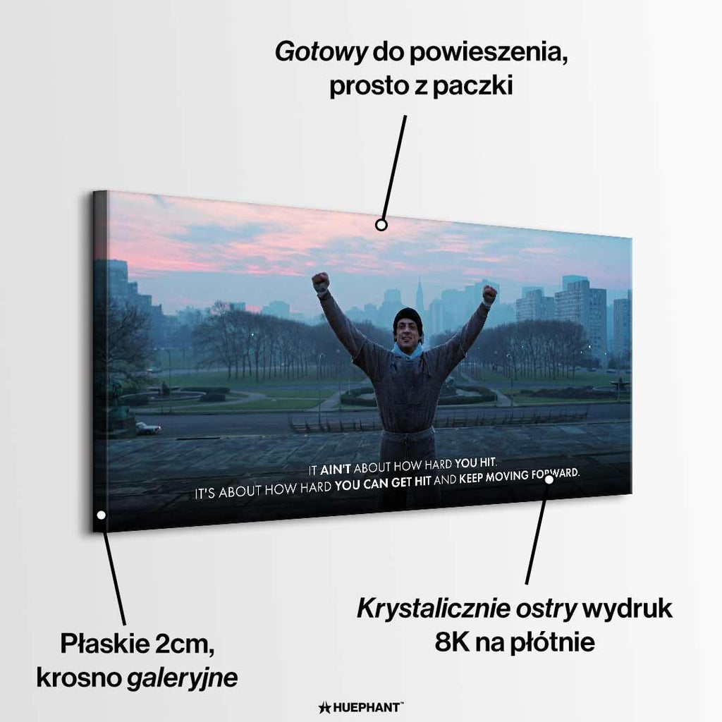 Motywacyjny obraz na płótnie z Rocky Balboa stojącym na schodach z uniesionymi rękami, symbol wytrwałości, siły charakteru i determinacji w drodze do sukcesu.