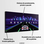 Wydruk galeryjny na płótnie w stylu pixel art przedstawiający biały sportowy samochód na autostradzie z napisem Keep Going i neonowym miastem.