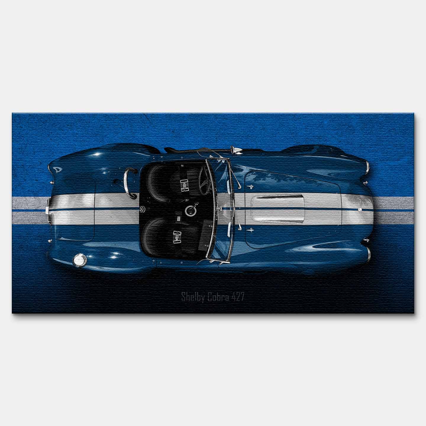 Obraz na płótnie Shelby Cobra 427 – widok z góry na niebieską klasyczną Cobrę z białymi pasami, motoryzacyjna sztuka.