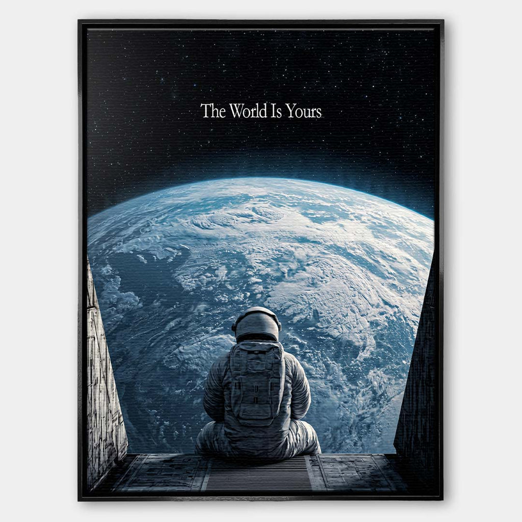 Nowoczesny obraz na płótnie z astronautą patrzącym na Ziemię z kosmosu i napisem The World Is Yours. Wydruk galeryjny w ciemnych barwach.
