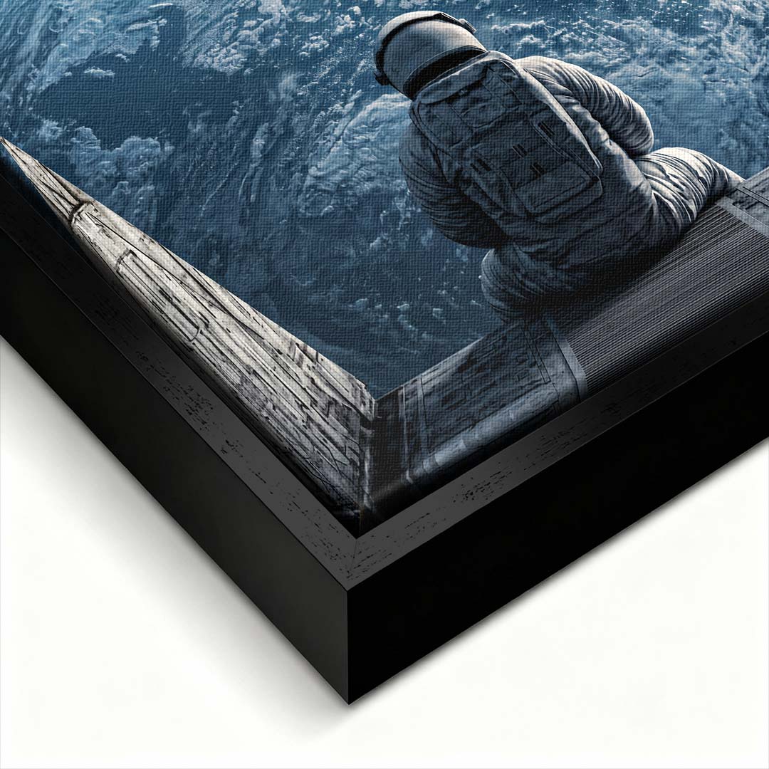 Nowoczesny obraz na płótnie z astronautą patrzącym na Ziemię z kosmosu i napisem The World Is Yours. Wydruk galeryjny w ciemnych barwach.