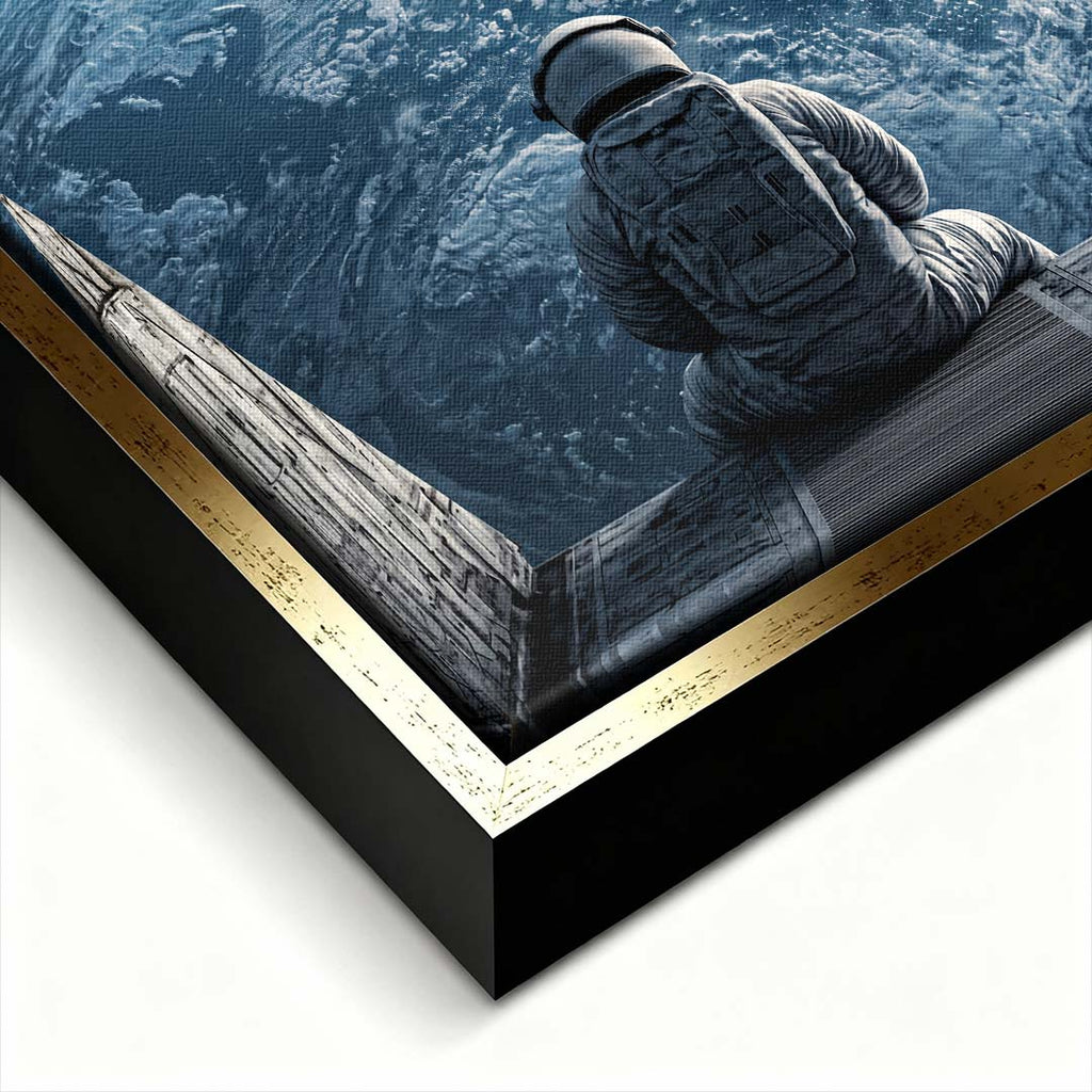 Nowoczesny obraz na płótnie z astronautą patrzącym na Ziemię z kosmosu i napisem The World Is Yours. Wydruk galeryjny w ciemnych barwach.