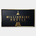 Motywacyjny obraz na płótnie z eleganckim złotym napisem Think Like A Millionaire Hustle Like You're Broke na czarnym tle, wydruk galeryjny do biura.