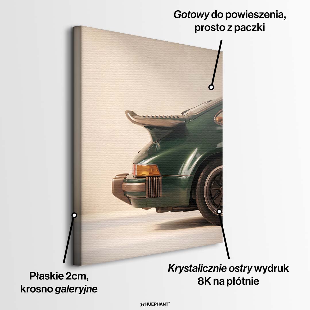 Obraz na płótnie Classic Spoiler przedstawiający zielony tył kultowego samochodu retro. Elegancki wydruk galeryjny dla miłośników klasycznej motoryzacji.