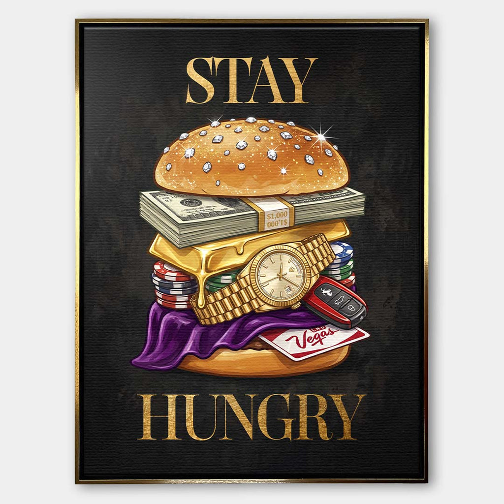 Nowoczesny obraz na płótnie przedstawiający burgera z banknotów, złota i zegarka oraz złoty napis STAY HUNGRY na czarnym tle. Wydruk galeryjny Huephant.